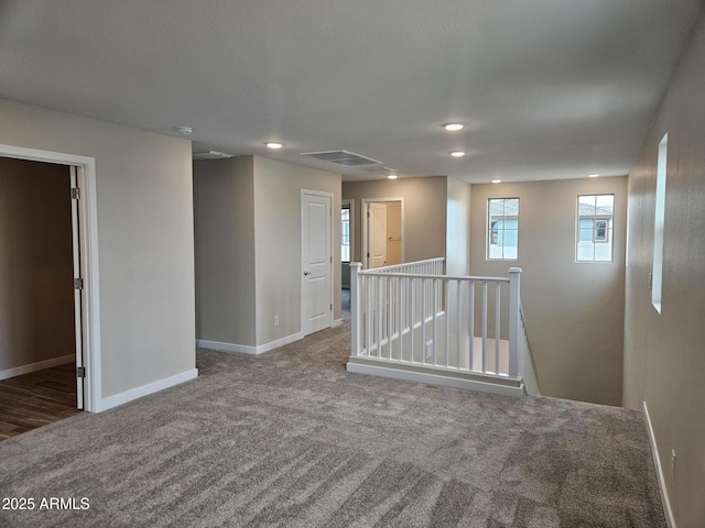 3390 S 180th Ln, Goodyear, AZ 85338 - unfurnished room with carpet floors, baseboards, and recessed lighting