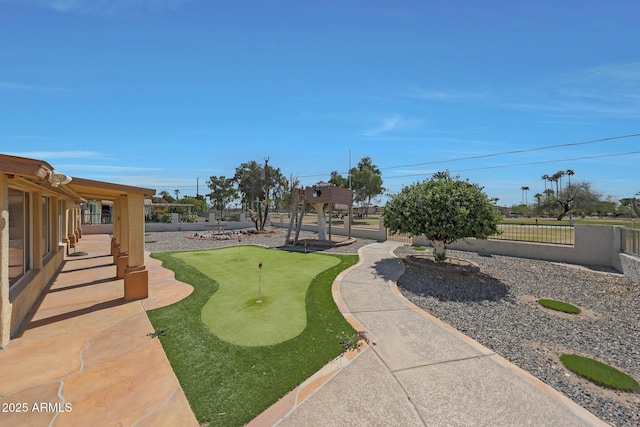 view of yard featuring a patio area and fence