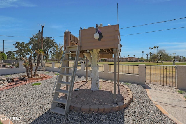 view of yard featuring a gate and fence