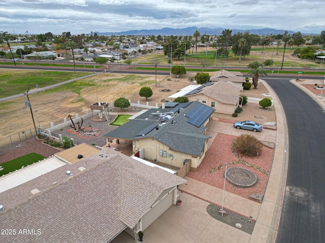 birds eye view of property with a mountain view and a residential view