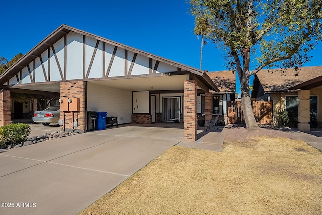 back of property featuring a carport