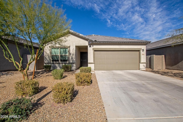 ranch-style home with a garage