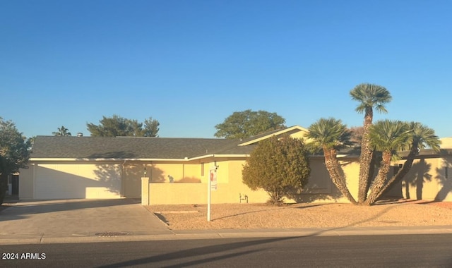 view of front of home with a garage