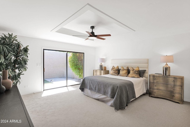 carpeted bedroom with access to exterior and ceiling fan