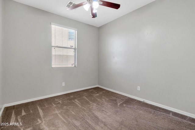 carpeted empty room with ceiling fan