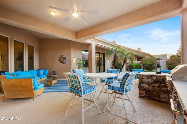 view of patio with ceiling fan, area for grilling, an outdoor living space, and a bar