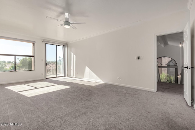 empty room featuring carpet, lofted ceiling with beams, ceiling fan, and ornamental molding