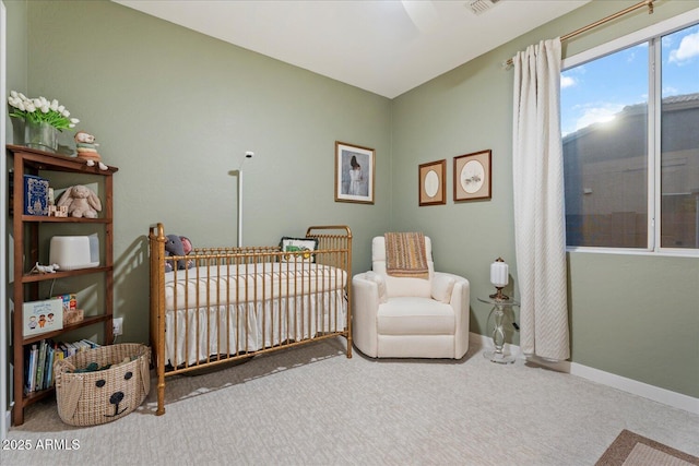 3604 E Derringer Way, Gilbert, AZ 85297 - bedroom with a crib, carpet flooring, and baseboards