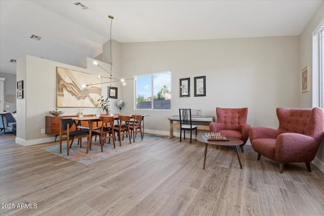 3604 E Derringer Way, Gilbert, AZ 85297 - dining space with light wood finished floors, baseboards, and high vaulted ceiling