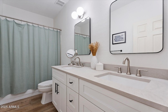 3604 E Derringer Way, Gilbert, AZ 85297 - full bathroom with toilet, wood finished floors, and double vanity