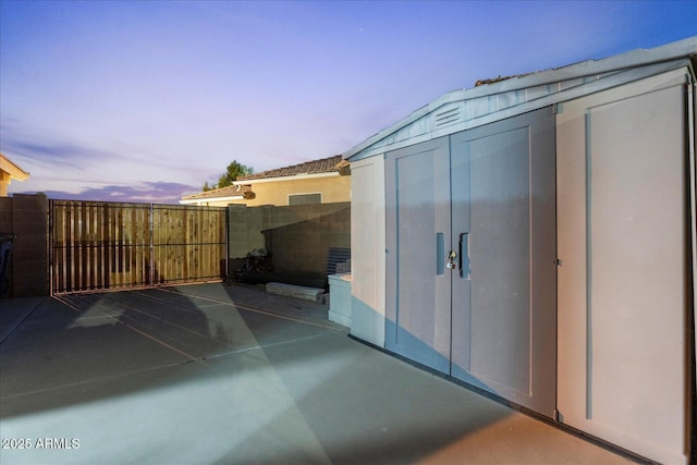 3604 E Derringer Way, Gilbert, AZ 85297 - view of patio featuring a shed, an outbuilding, and fence