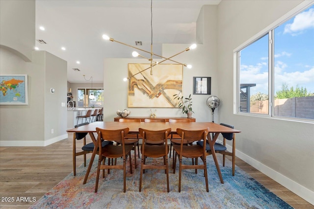 3604 E Derringer Way, Gilbert, AZ 85297 - dining space featuring wood finished floors, baseboards, and recessed lighting