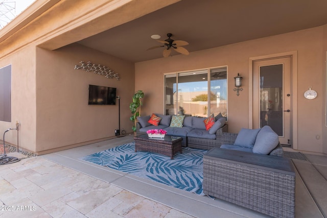 view of patio featuring an outdoor hangout area and ceiling fan