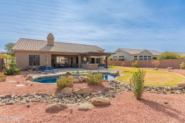 view of swimming pool with a jacuzzi and a patio area