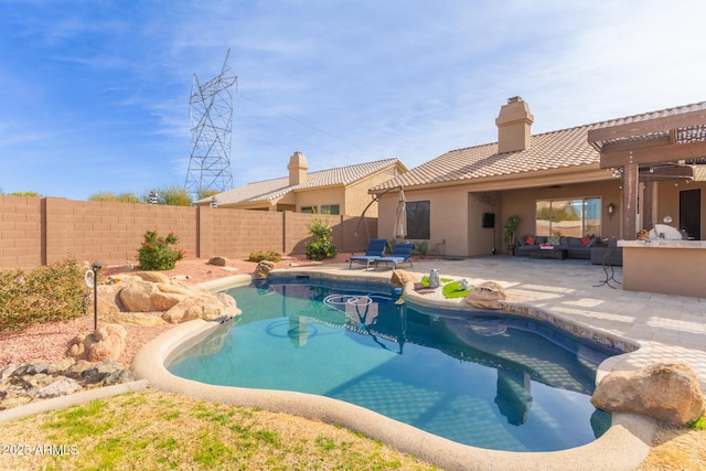 view of pool featuring outdoor lounge area and a patio area