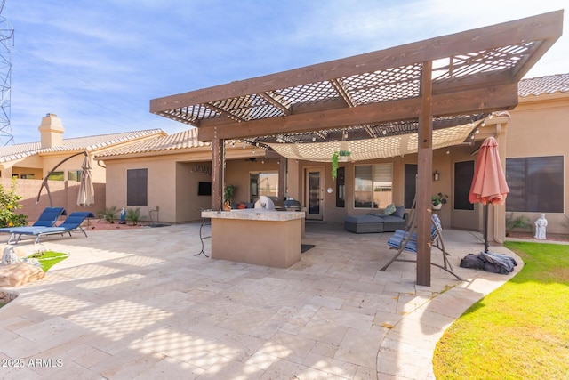 view of patio / terrace featuring area for grilling, a pergola, and outdoor lounge area