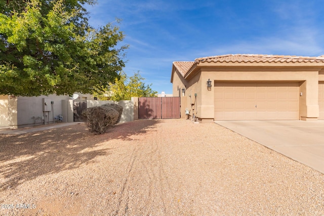 view of home's exterior with a garage