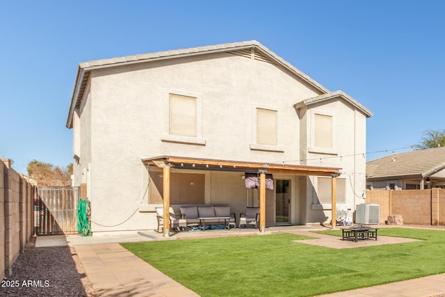 rear view of house with a lawn, central air condition unit, outdoor lounge area, and a patio