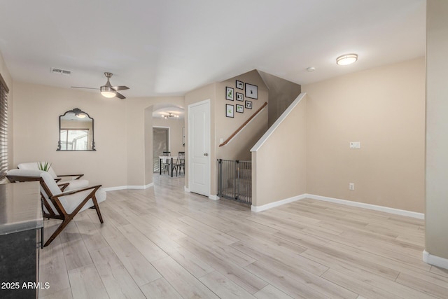 interior space featuring ceiling fan and light wood-type flooring