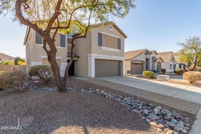 view of front of property featuring a garage