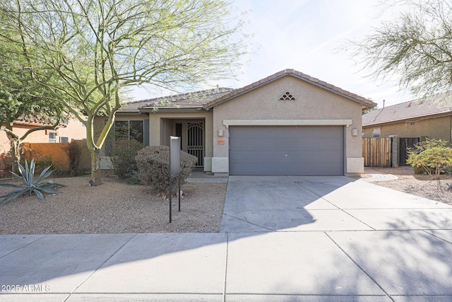 ranch-style home featuring a garage