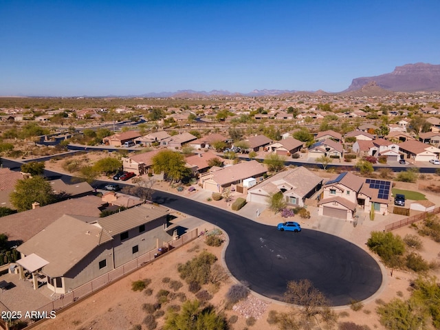 birds eye view of property featuring a mountain view