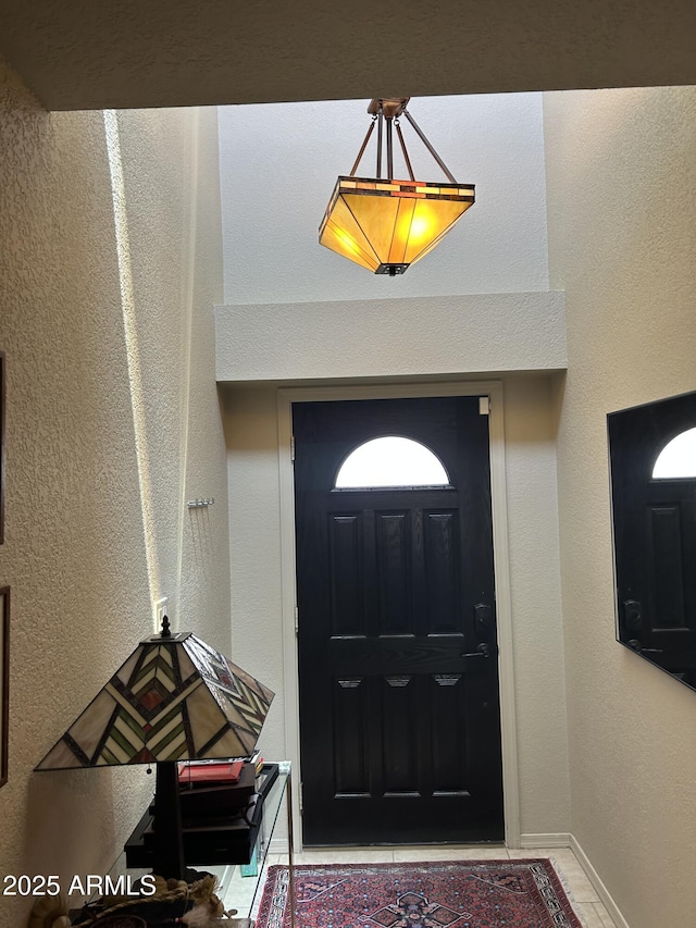 2413 E Rancho Dr, Phoenix, AZ 85016 - foyer featuring baseboards and a textured wall