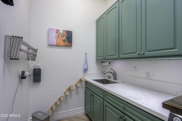 interior space with sink and light wood-type flooring