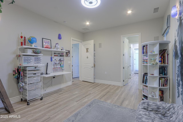 bedroom featuring light hardwood / wood-style flooring