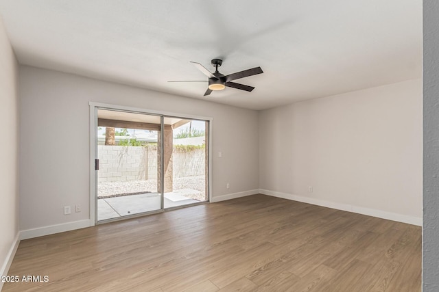 5526 N 77th Way, Scottsdale, AZ 85250 - spare room featuring ceiling fan, light wood finished floors, and baseboards