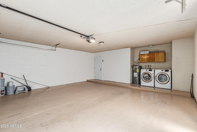 5526 N 77th Way, Scottsdale, AZ 85250 - garage featuring electric water heater, washer and dryer, and a garage door opener