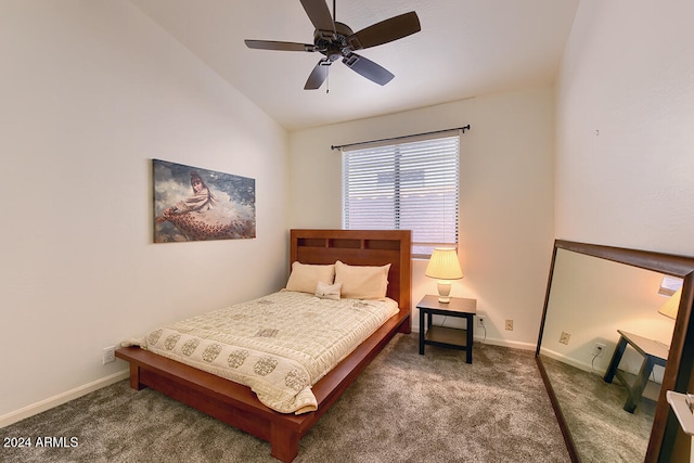 bedroom featuring ceiling fan, dark carpet, and lofted ceiling