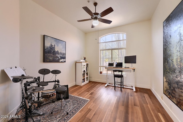 office with hardwood / wood-style floors and ceiling fan