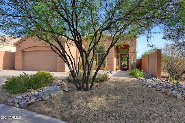 view of front of property featuring a garage