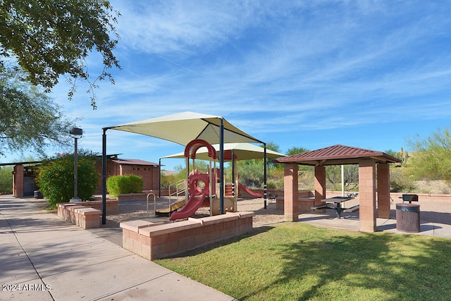 view of play area featuring a yard