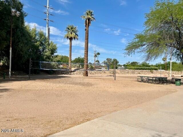 view of home's community with volleyball court