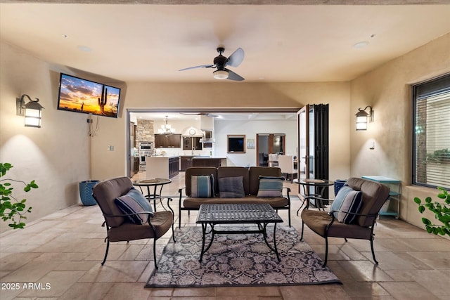 view of patio / terrace featuring an outdoor hangout area and ceiling fan