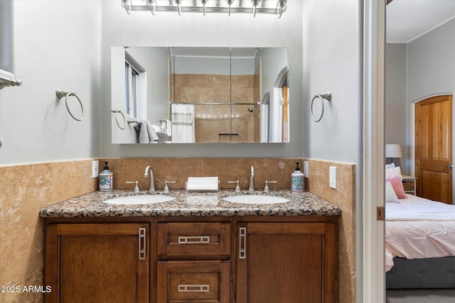 bathroom with vanity and curtained shower