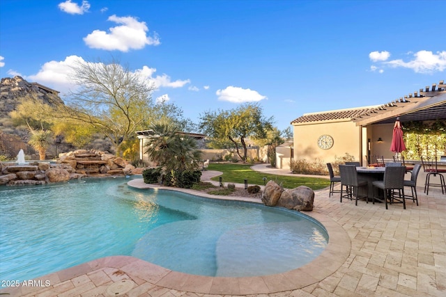 view of swimming pool featuring a patio