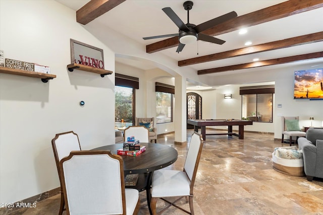 dining space with ceiling fan, beam ceiling, and billiards