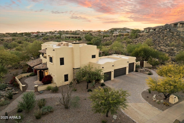 view of aerial view at dusk