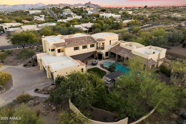 view of aerial view at dusk