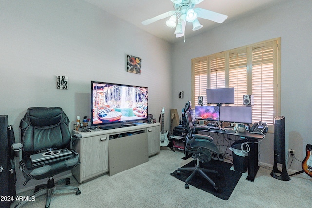 carpeted home office with ceiling fan