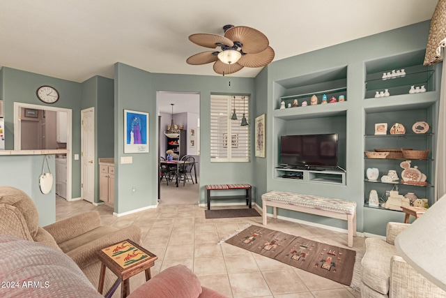 living room featuring ceiling fan, built in features, and light tile patterned flooring