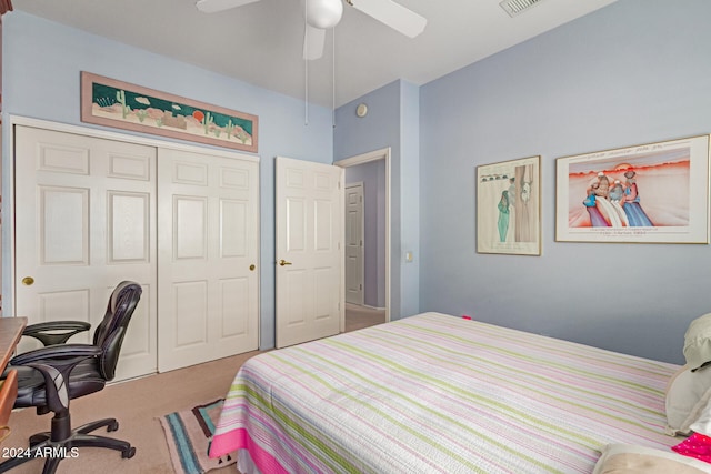 bedroom featuring carpet flooring, ceiling fan, and a closet