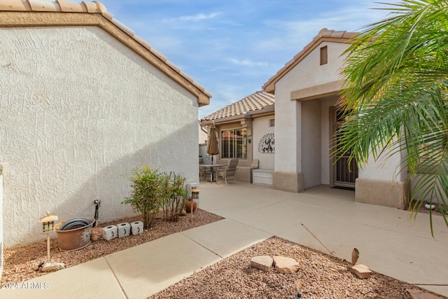 exterior space with a patio area