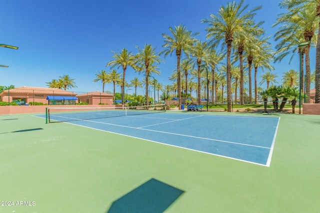 view of sport court with basketball hoop