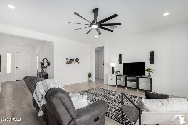 3089 N 200th Ave, Buckeye, AZ 85396 - living area with a ceiling fan, wood finished floors, and recessed lighting
