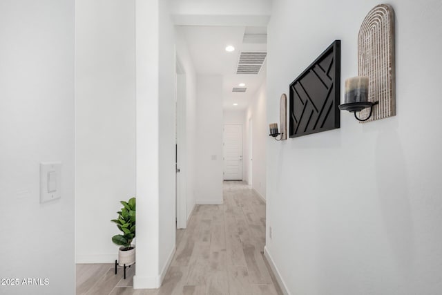 3089 N 200th Ave, Buckeye, AZ 85396 - hallway with light wood finished floors, baseboards, and recessed lighting