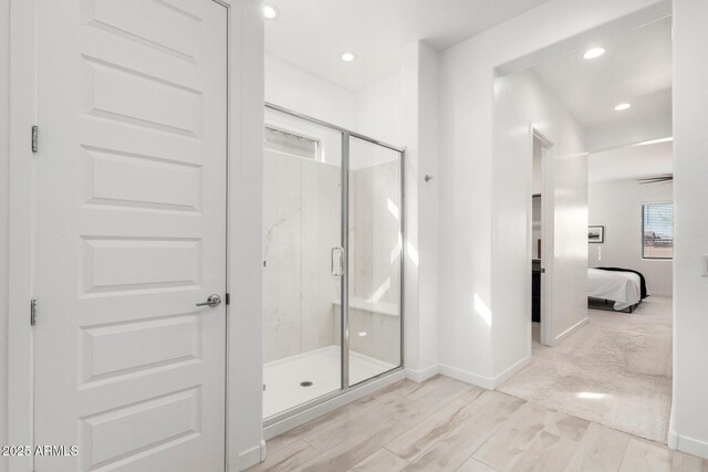 3089 N 200th Ave, Buckeye, AZ 85396 - bathroom with ensuite bathroom, a marble finish shower, recessed lighting, and baseboards